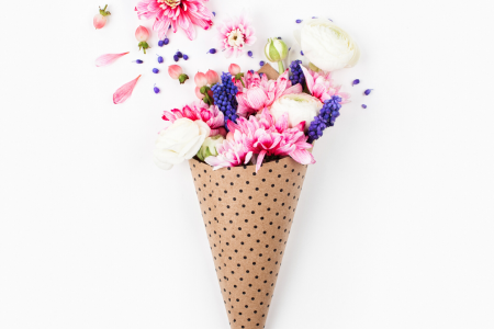 Flowers coming out of an icecream cone.